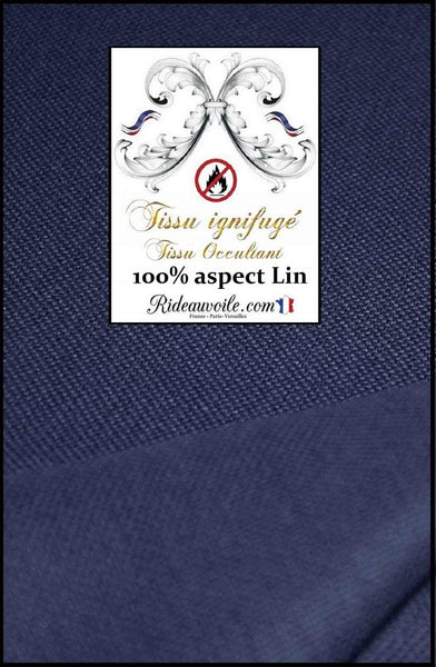 Tissu ignifuge d'ameublement pour la décoration d'intérieur, il est 100% occultant, d'un aspect texturé lin uni en largeur 150cm. Idéal pour les rideaux, les stores et les coussins. 