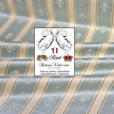 Le tissu jacquard extra large et de haute qualité de 280 cm avec une surface légèrement brillante montre ce qui est probablement le symbole le plus célèbre de la monarchie française : le lys français (Fleur de Lys). 