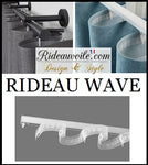La finition wave classique utilise une ruflette piquée à plat avec des intervalles de 8 cm entre chaque glisseur. La finition du haut de rideau en Wave est l’une des plus pratiques, avec ses fixations
