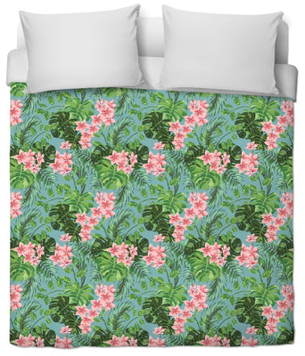 Tissu au mètre bleu tapisserie exotique tropical feuilles vertes fleur rose